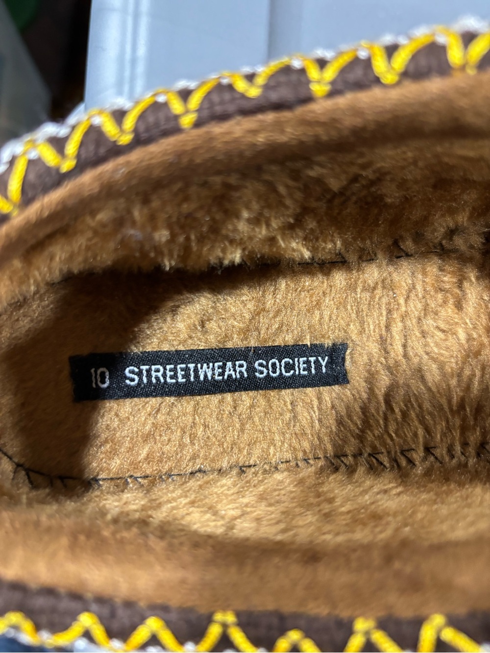 Streetwear Society Adult Brown Fuzzy Moccasin Slippers with Yellow Stitching